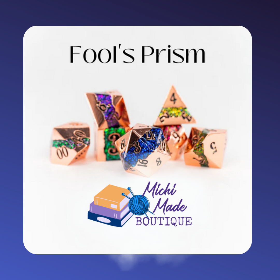 Rose-gold metal dice with rainbow glitter insets.