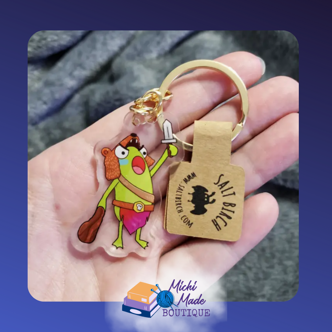 Barbarian frog keychain in bear hat with sword and club.