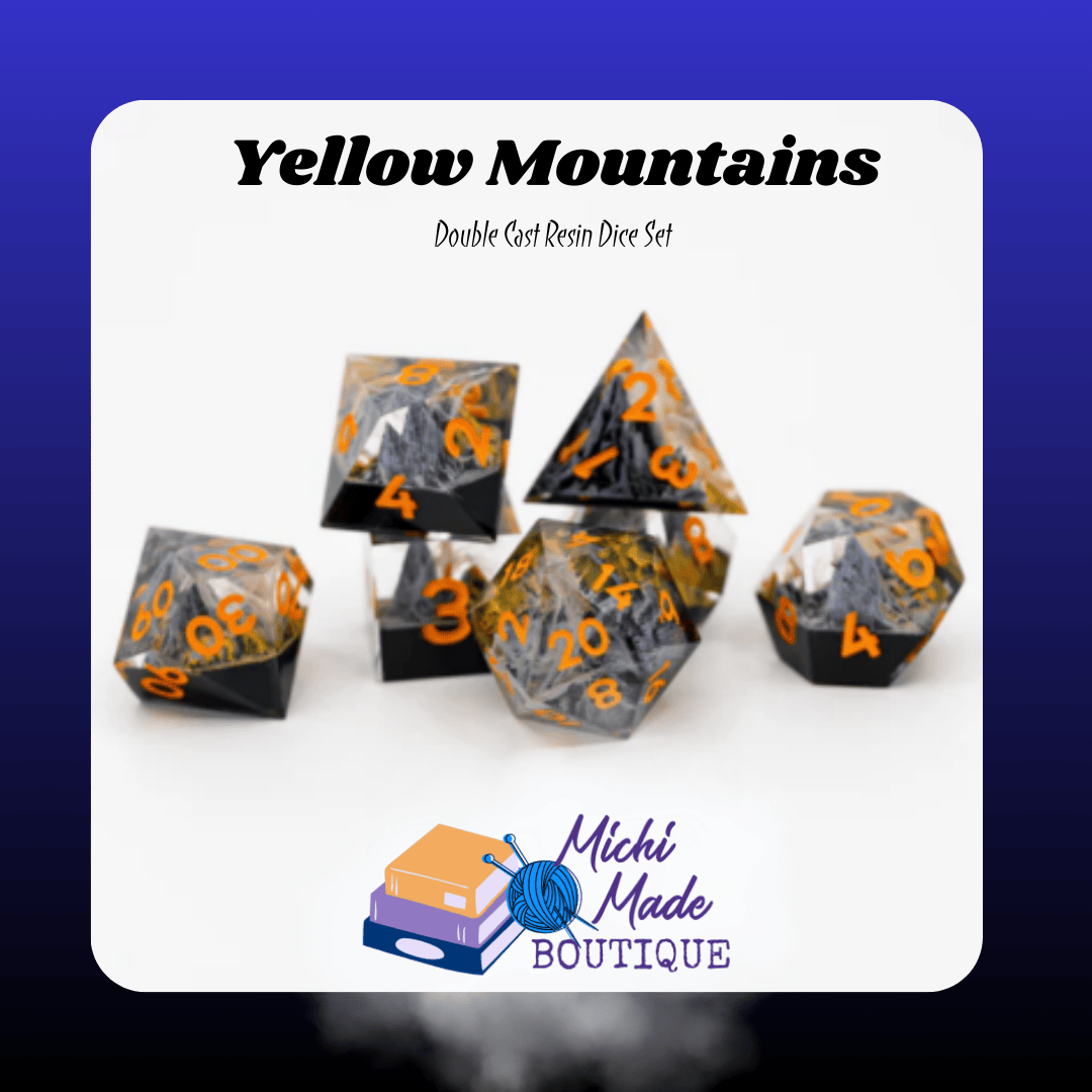 Yellow Mountains – 7 Piece Set — Golden mountain diorama dice with vivid orange numbers, full set.