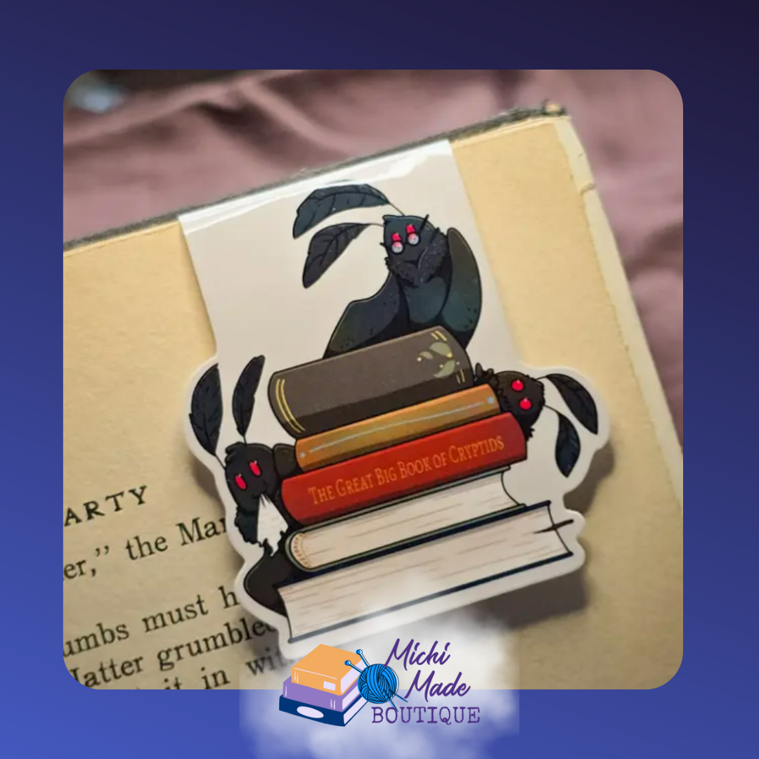 Three Mothman figures around a stack of books.