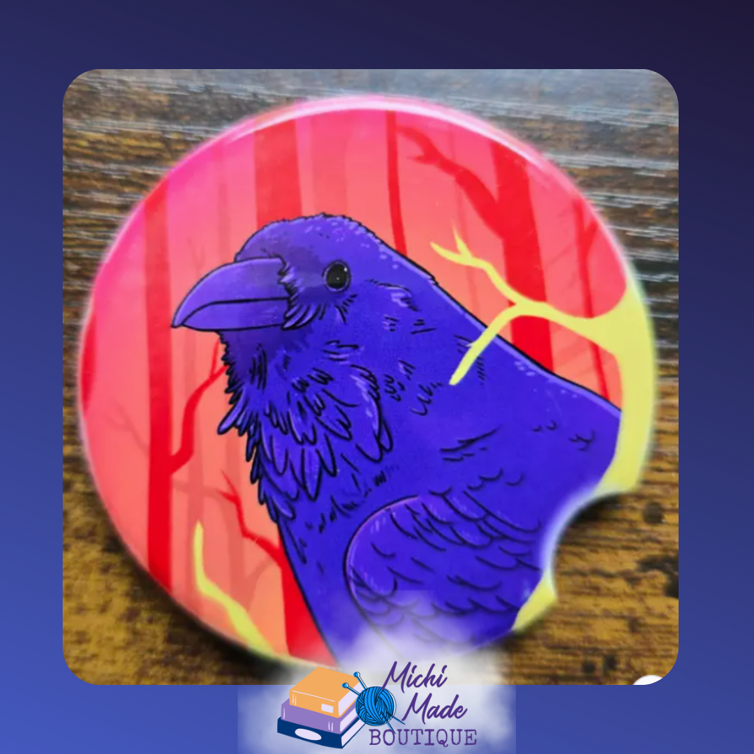 Ceramic car coaster with purple raven illustration on a red-orange forest background.
