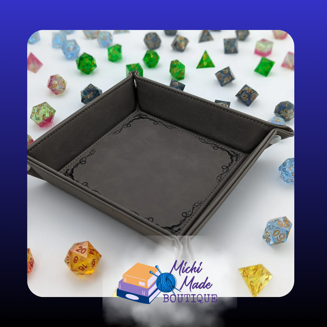 Grey tray with ornate engraved border design.