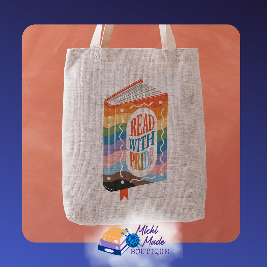 Read With Pride - tote with rainbow book design that reads “Read With Pride.”