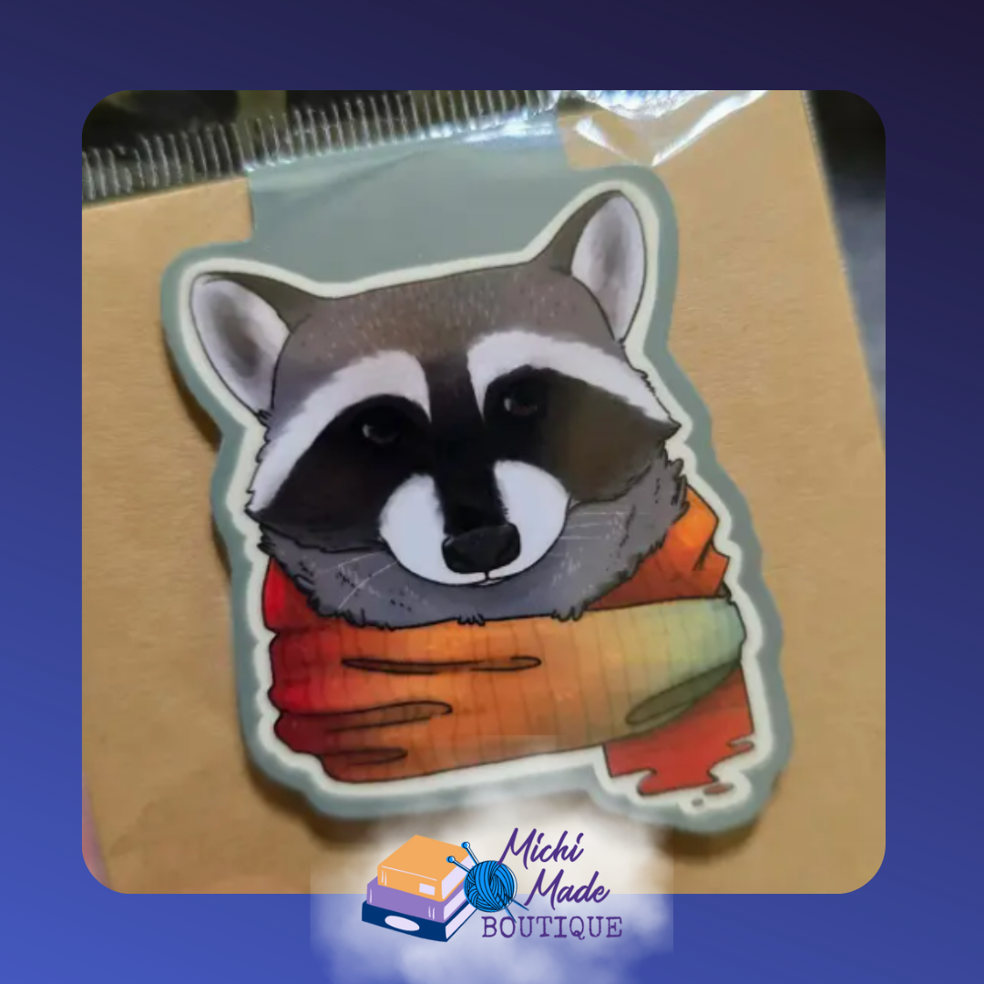 Close-up raccoon face with little smile.