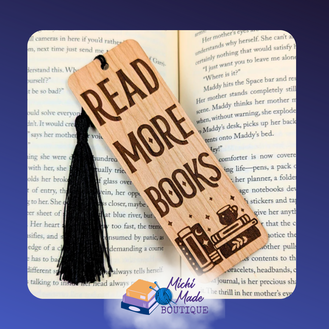 Wooden bookmark with “Read More Books” text and stacked books design, black tassel attached.