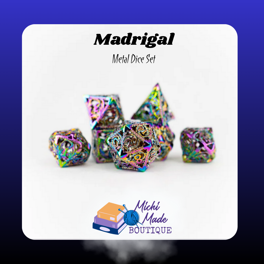 Seven-piece Madrigal hollow metal dice set with prismatic rainbow plating and intricate metalwork.