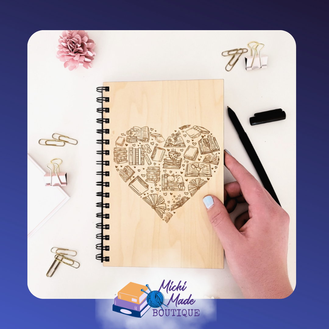 Book Lover - Wooden journal with laser-engraved heart filled with book and reading-themed icons.