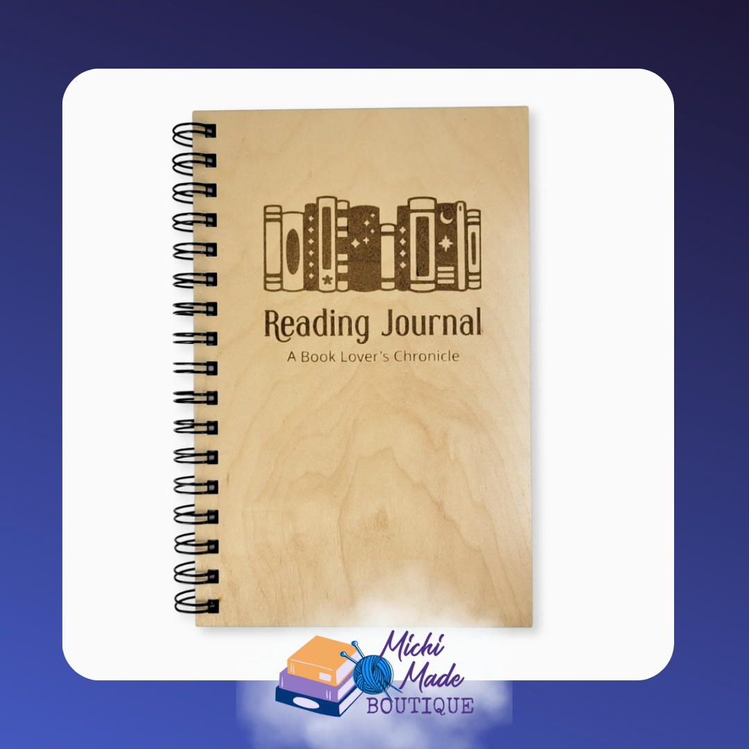 Wood cover reading journal with engraved books featuring stars and moons, with “Reading Journal: A Book Lover’s Chronicle” text.