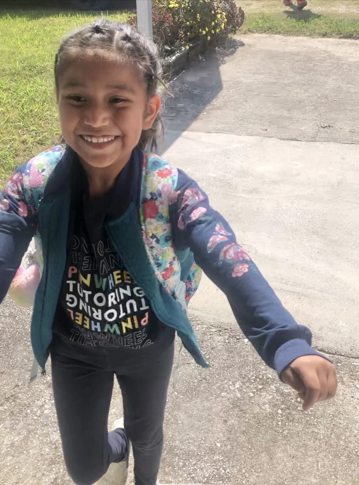 Katy running inside for the first day back at Pinwheel!