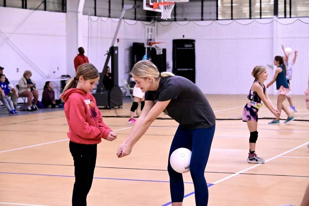coach-teaching-volleyball.jpeg