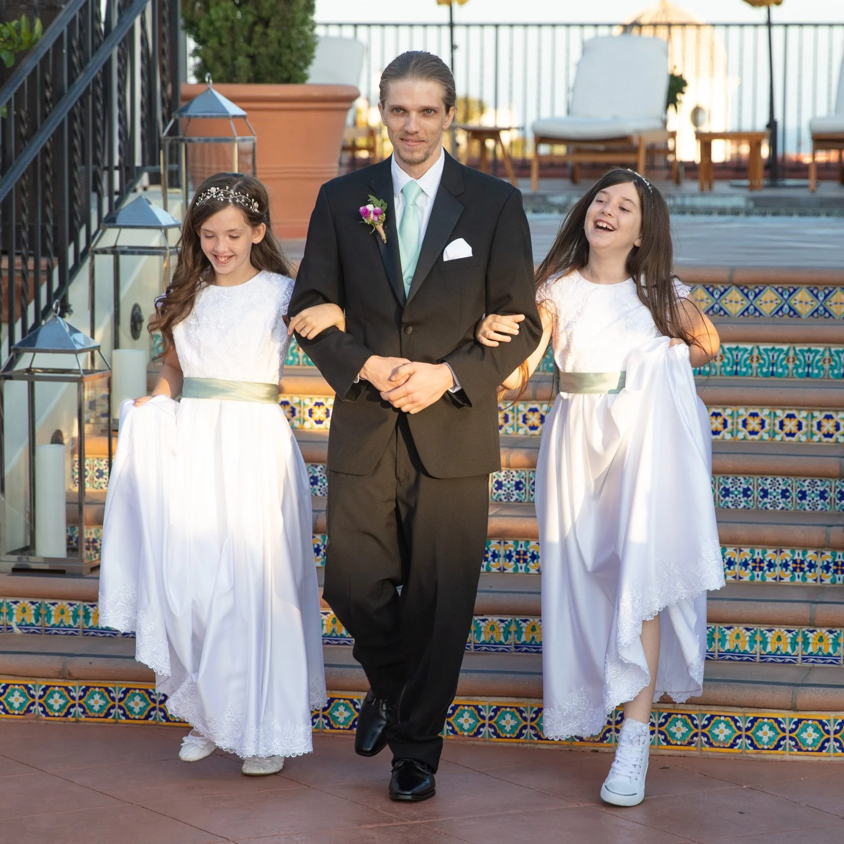 blended-family-wedding-aisle-new-sisters.jpg