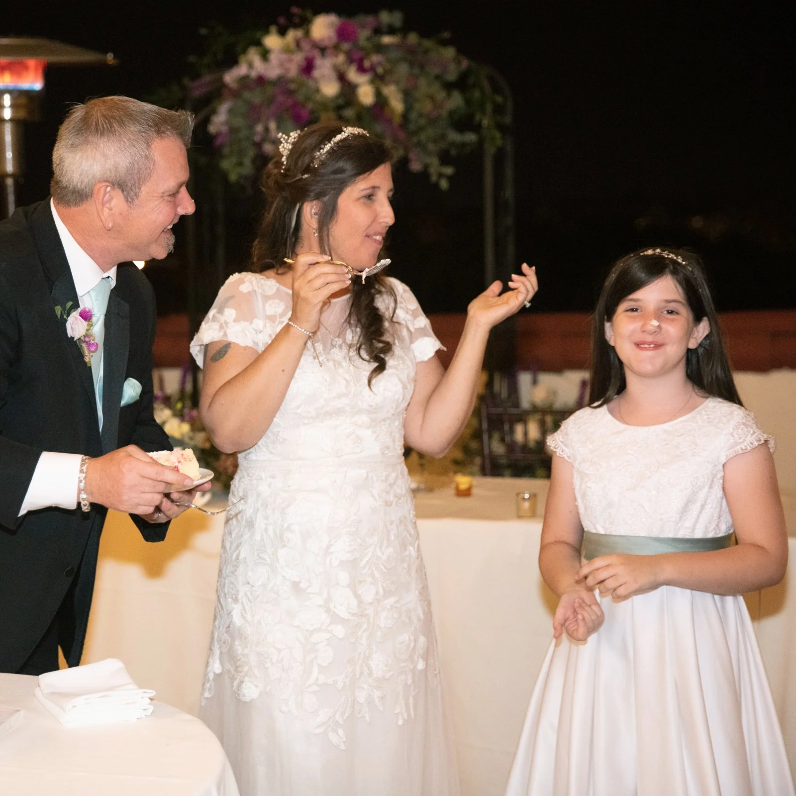 blended-family-wedding-Santa-Barbara-cake-cutting-daughter.jpg