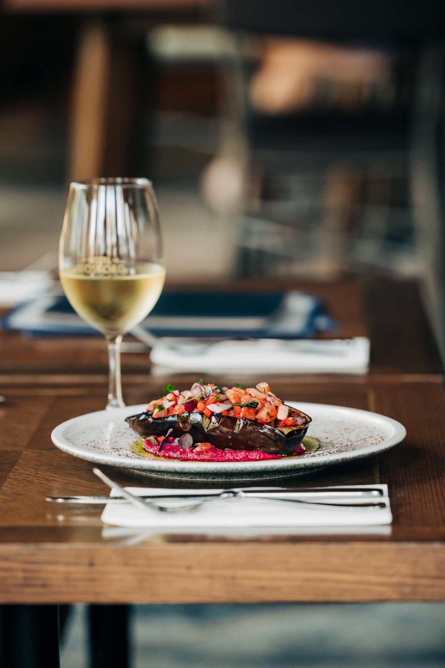 With the arrival of cosy Autumn evenings, there's no better time to wine and dine by the fire at Hotel Gosford.

Starting today, our Spiced Eggplant will be gracing our specials board - served with Roasted Hummus, Salsa Rosa, and Parsley Oil.

Try th