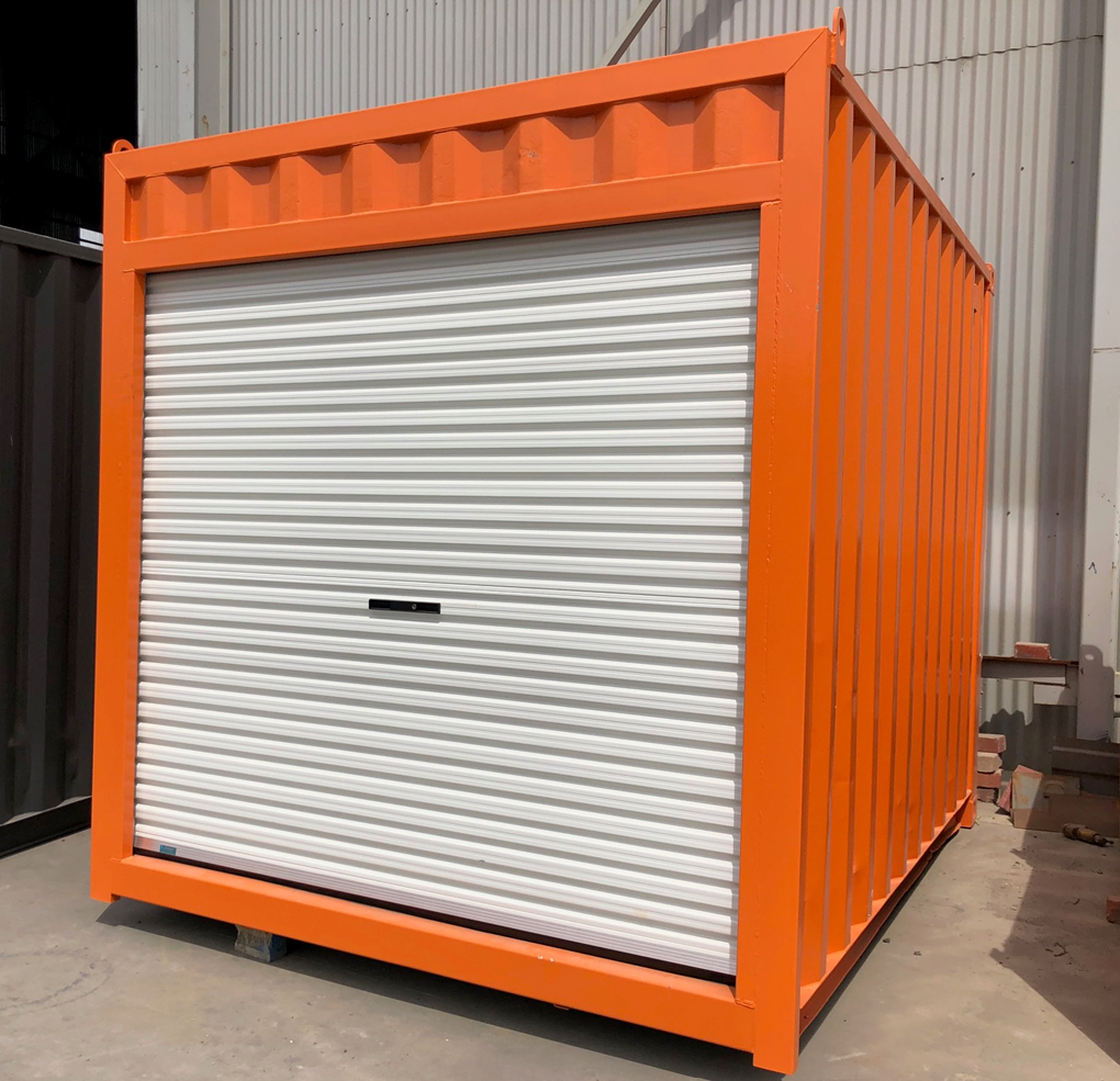 A 10ft orange shipping container with a white roller door
