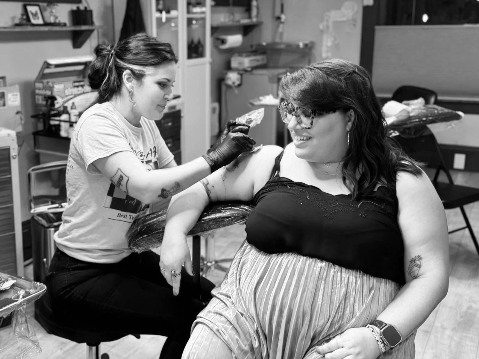 Fine line arm tattoo by Portland, OR lady tattooer. Fine line tattoo artist. Fun tattoo artist. Creative tattoo artist.  Body art being done.