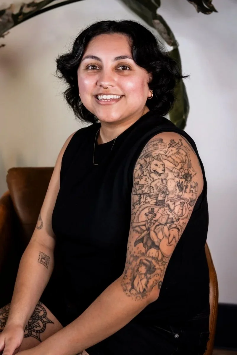 Half sleeve tattoo on brown skin