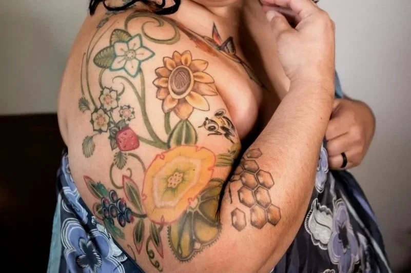 Color ink tattoo on brown skin