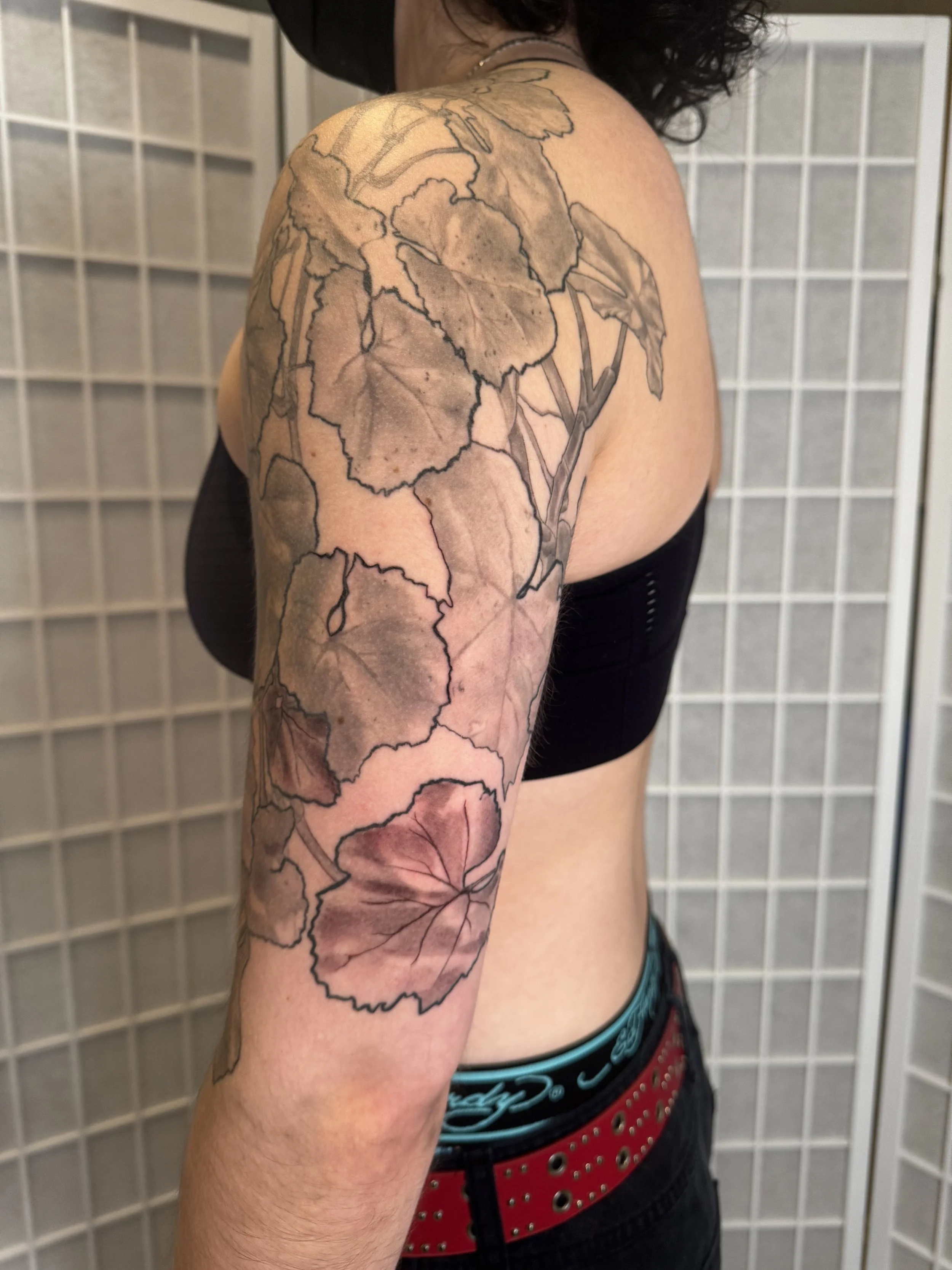 Flora and fauna tattoo, plant tattoo, leaves tattoo, black and grey tattoo by Black tattoo artist Ciel at Tattoo 34 on Hawthorne in Portland, Oregon.