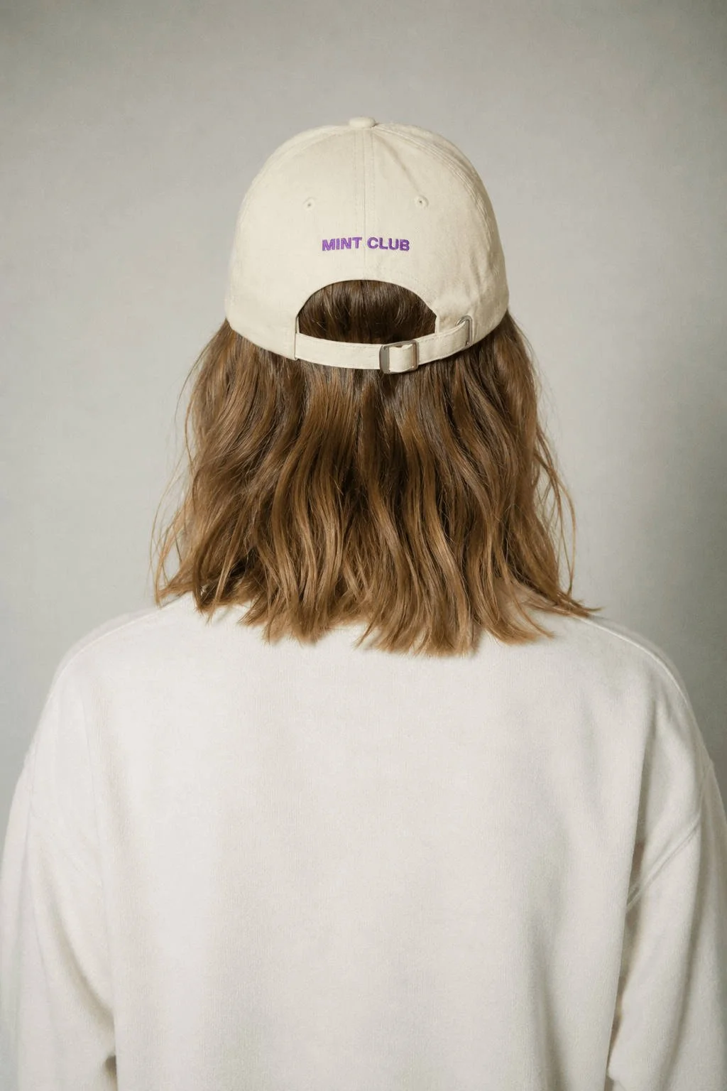 Quak-Quak-Kapperl-Studio-Beige-Lila-Back-klein.jpg
