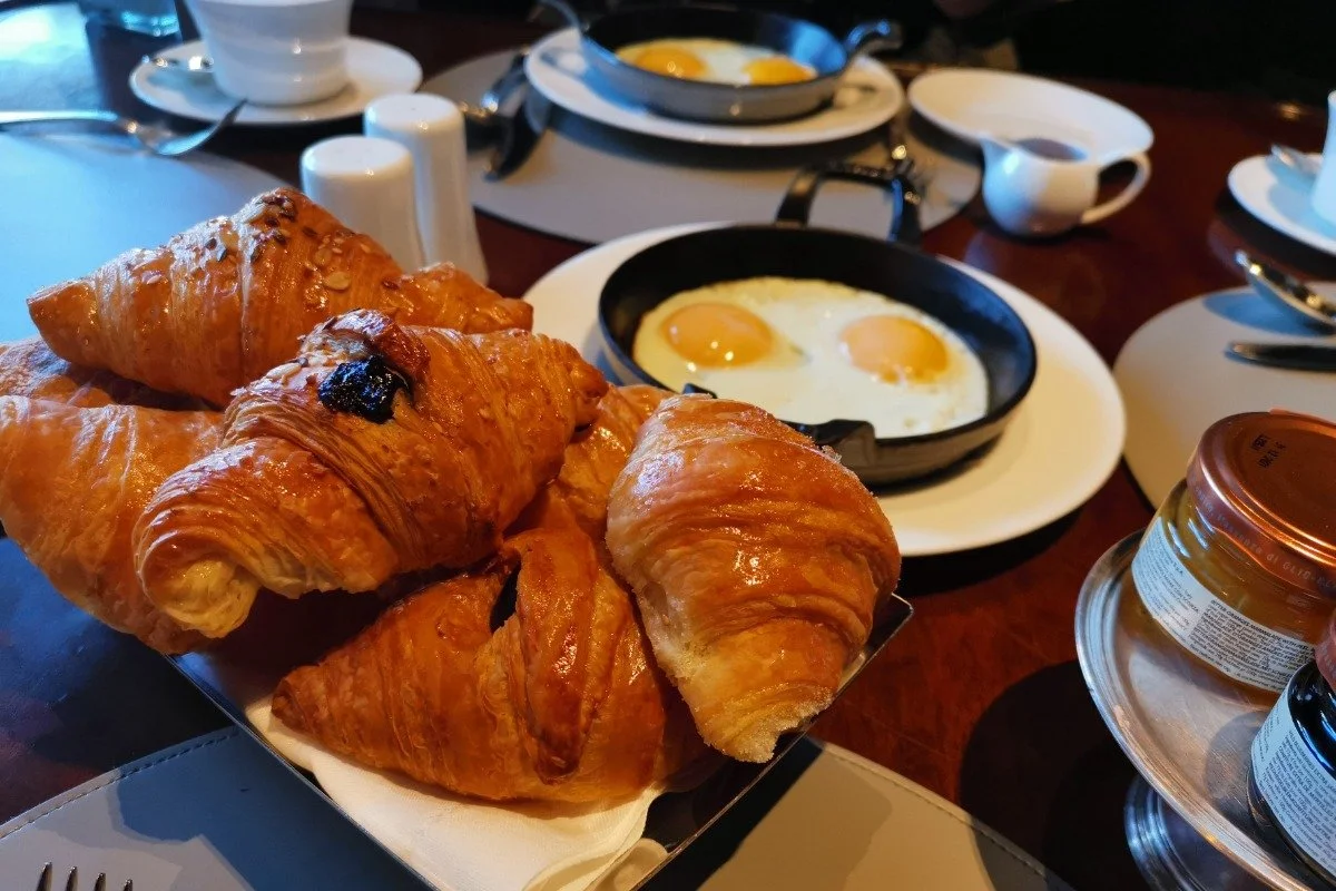 continental breakfast crossaint and eggs
