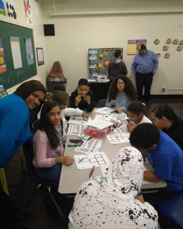 Our after school scholars grades 6 &amp; 7 graders are shown teaching our 3 &amp; 4 graders how to use ozobots #tech #ozobots #newskills #learning #afterschool