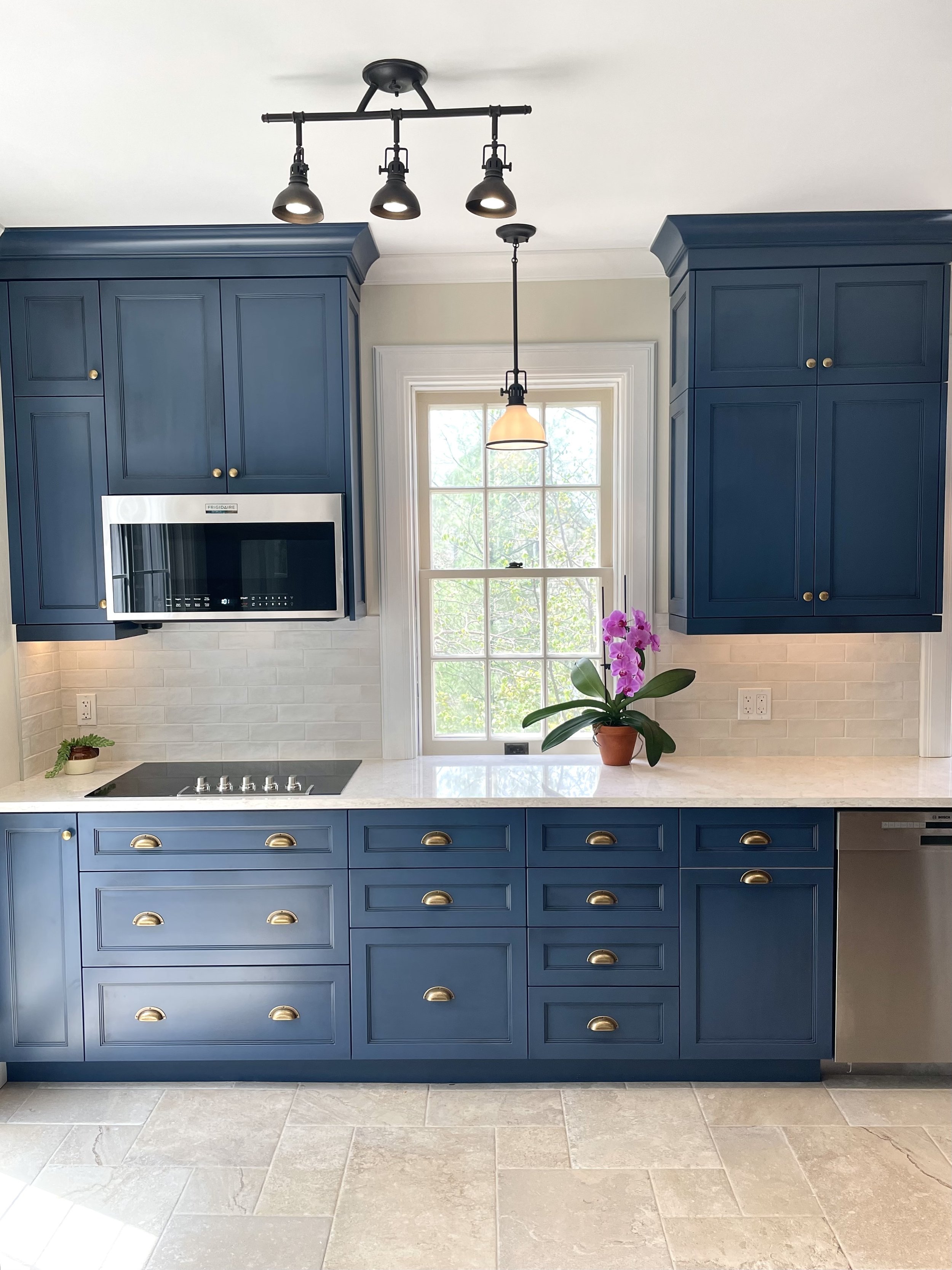 Kitchen renovation with custom blue cabinets.jpg