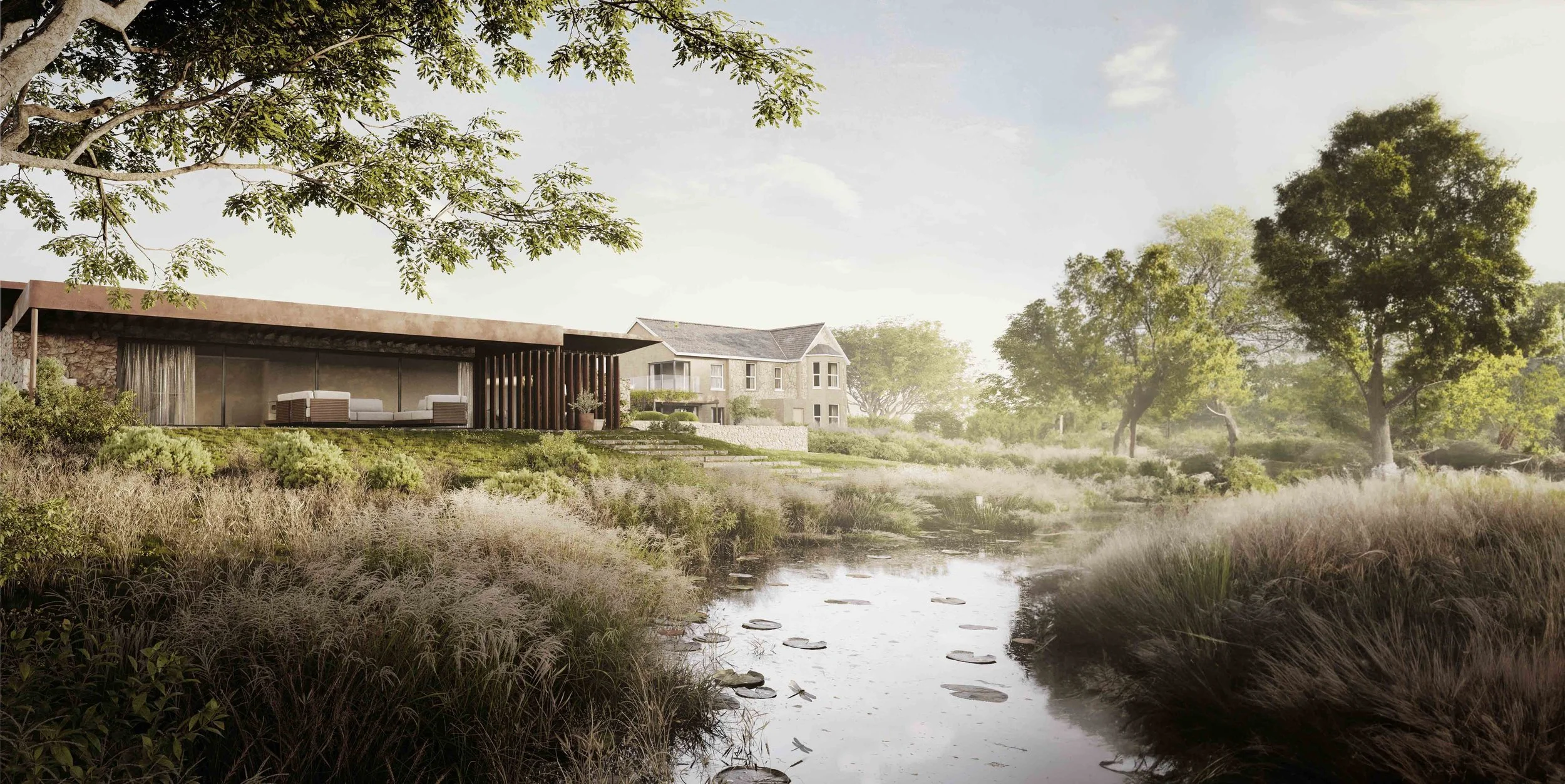 Contemporary pavilion with natural stone walls and a rusted steel roof beside a landscaped pond at Rolling Hills, Wroxall, Isle of Wight.