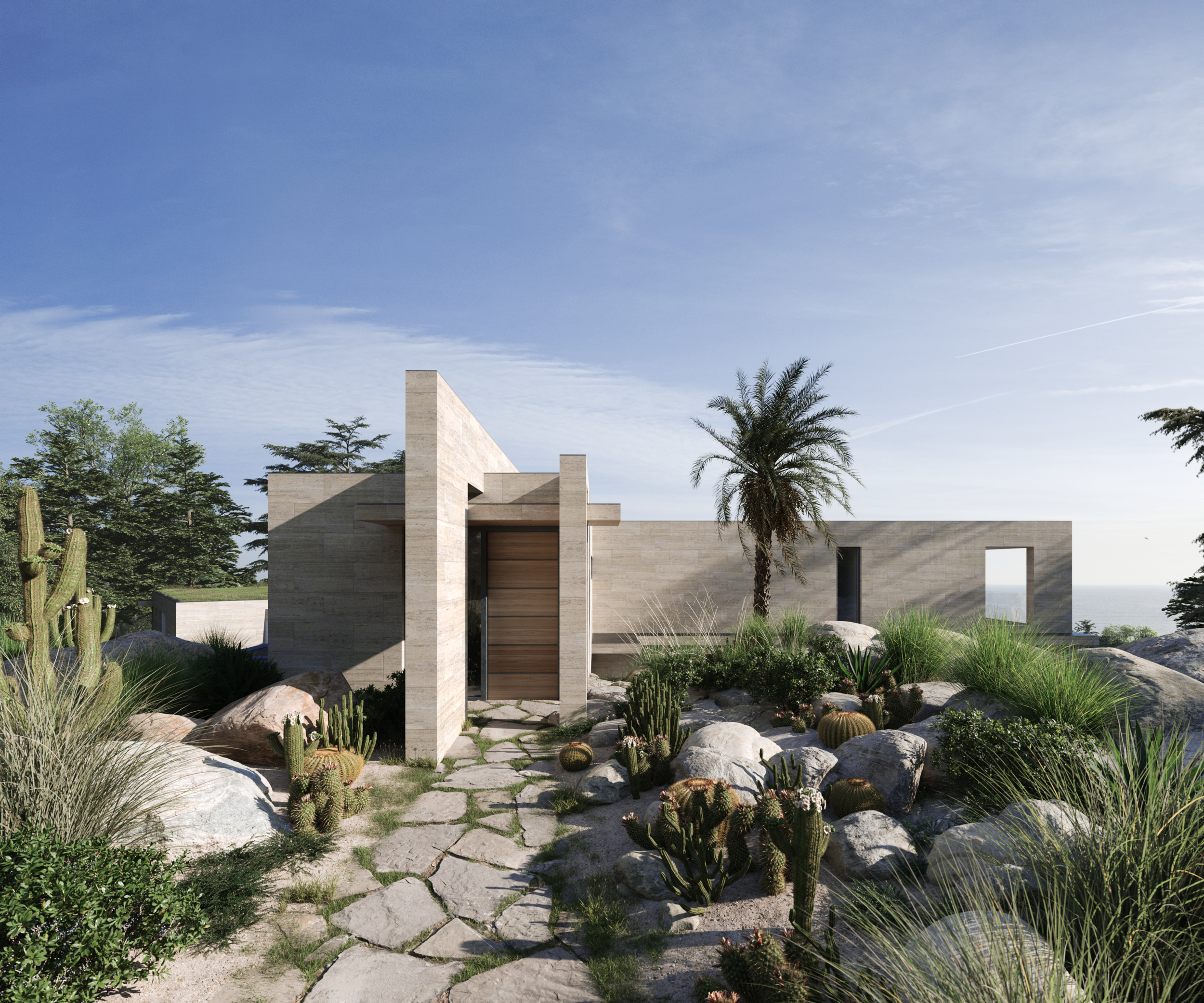 Contemporary coastal house with pale stone walls, a recessed timber entrance and naturalistic planting among coastal rocks at St Lawrence, Isle of Wight.