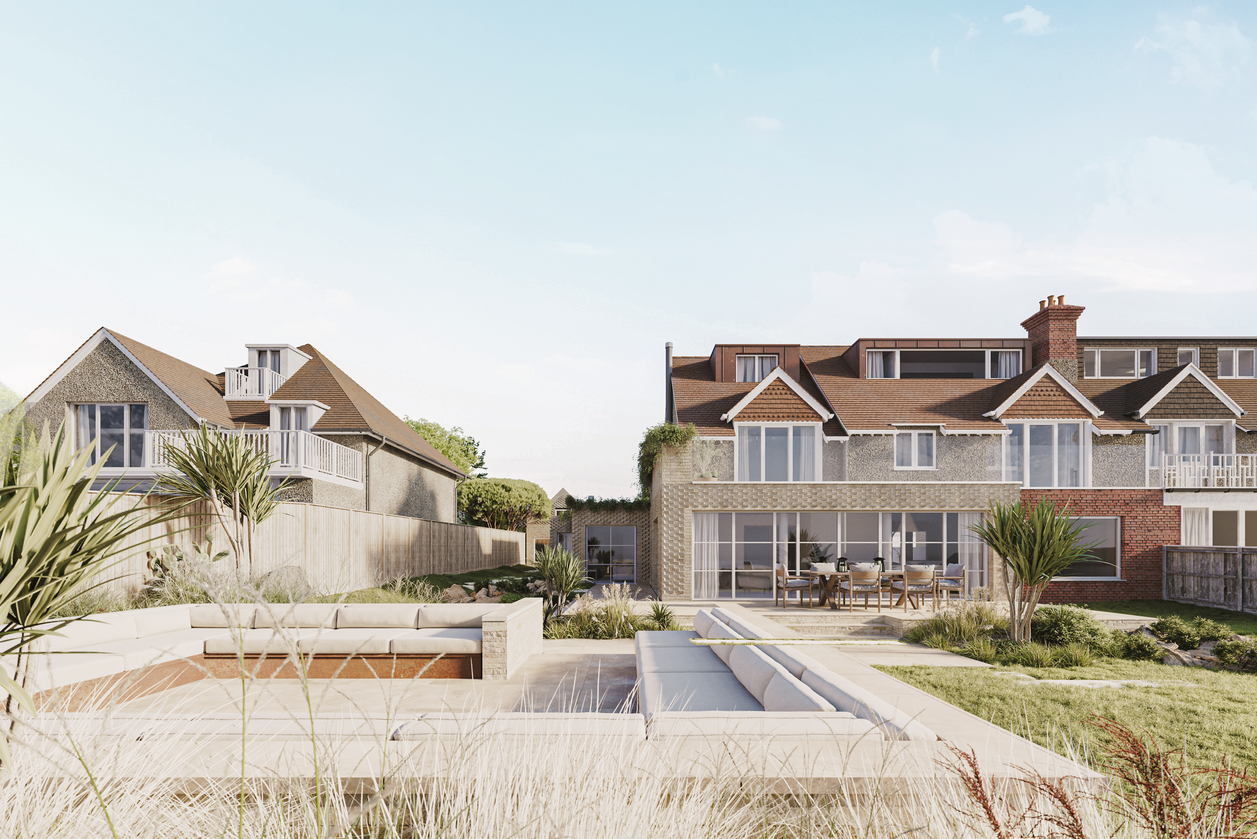 Contemporary extension to Fairylee, a seaside home in Seaview, Isle of Wight, featuring patterned brickwork, large glazed doors and a landscaped garden.