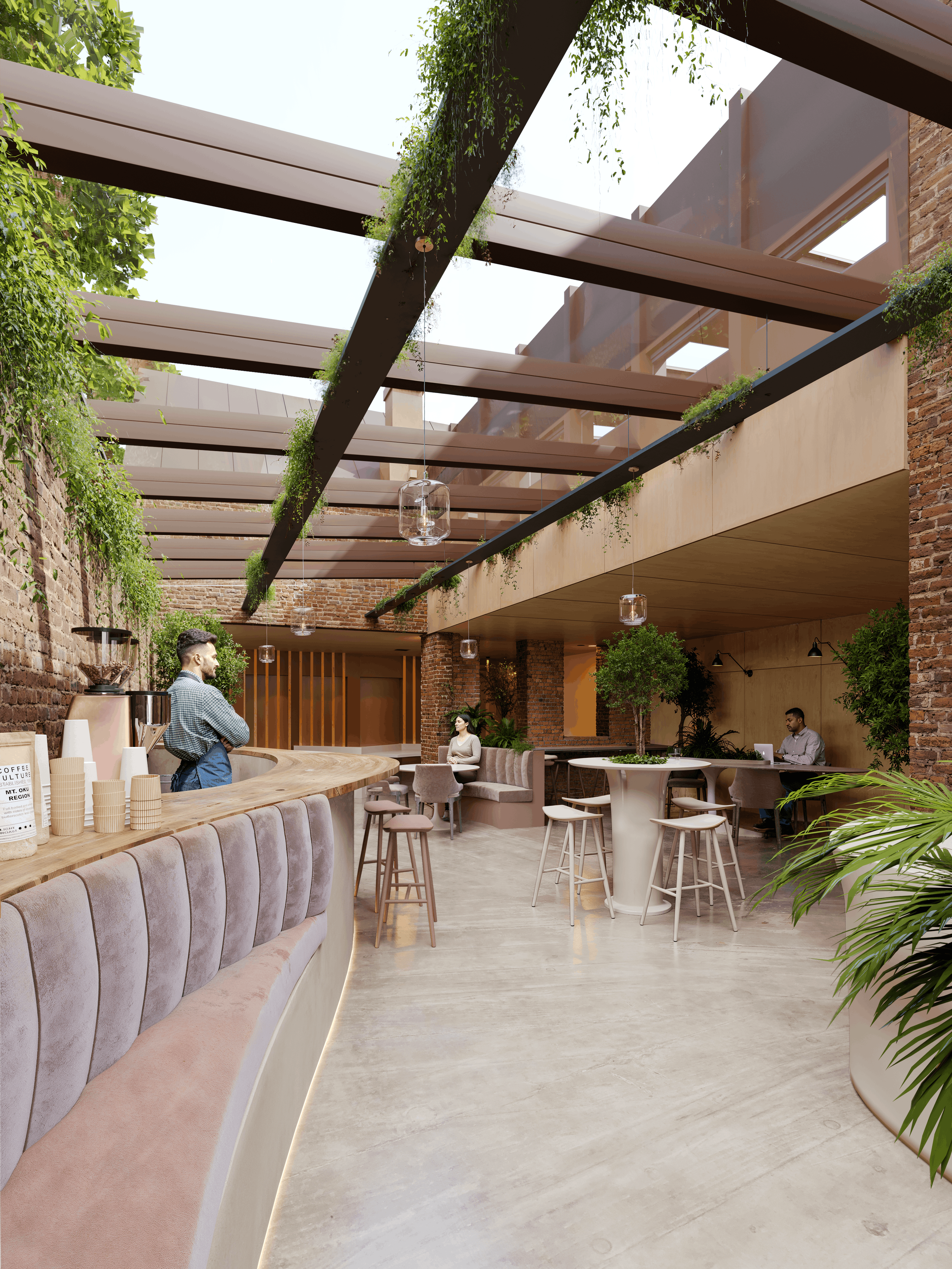 Light-filled commercial interior at The Old Forge, with exposed brick walls, glazed overhead sections, contemporary seating and Corten steel structural detailing.
