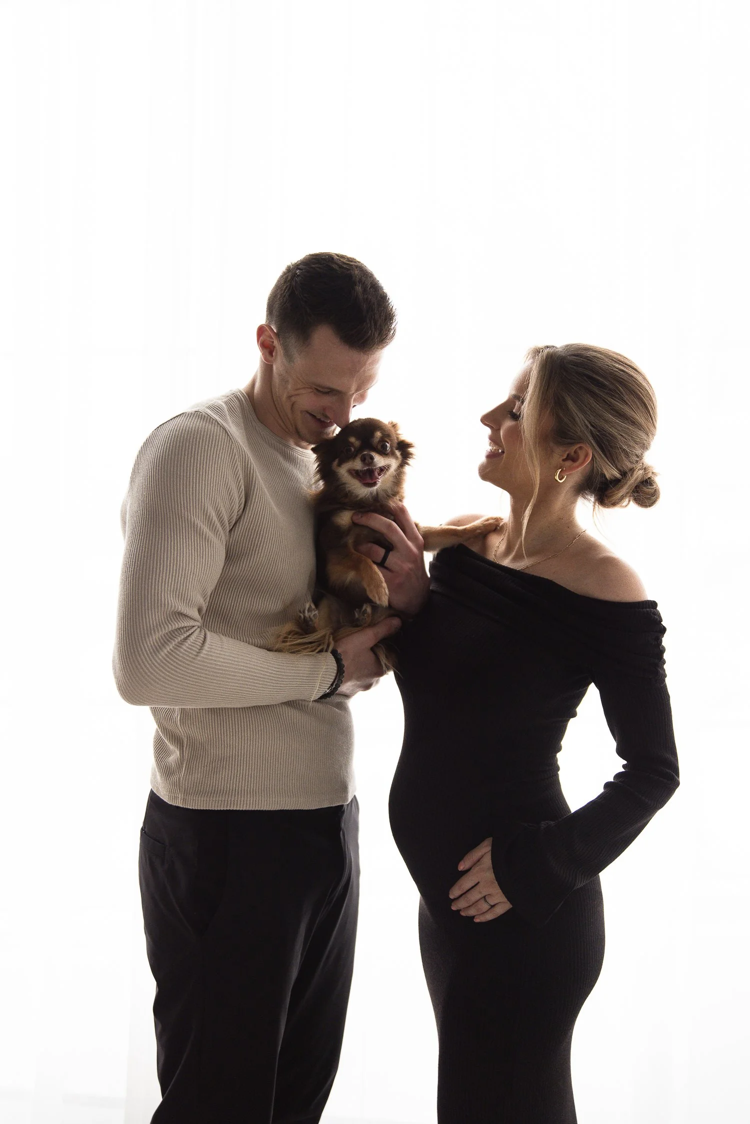 maternity couple with dog