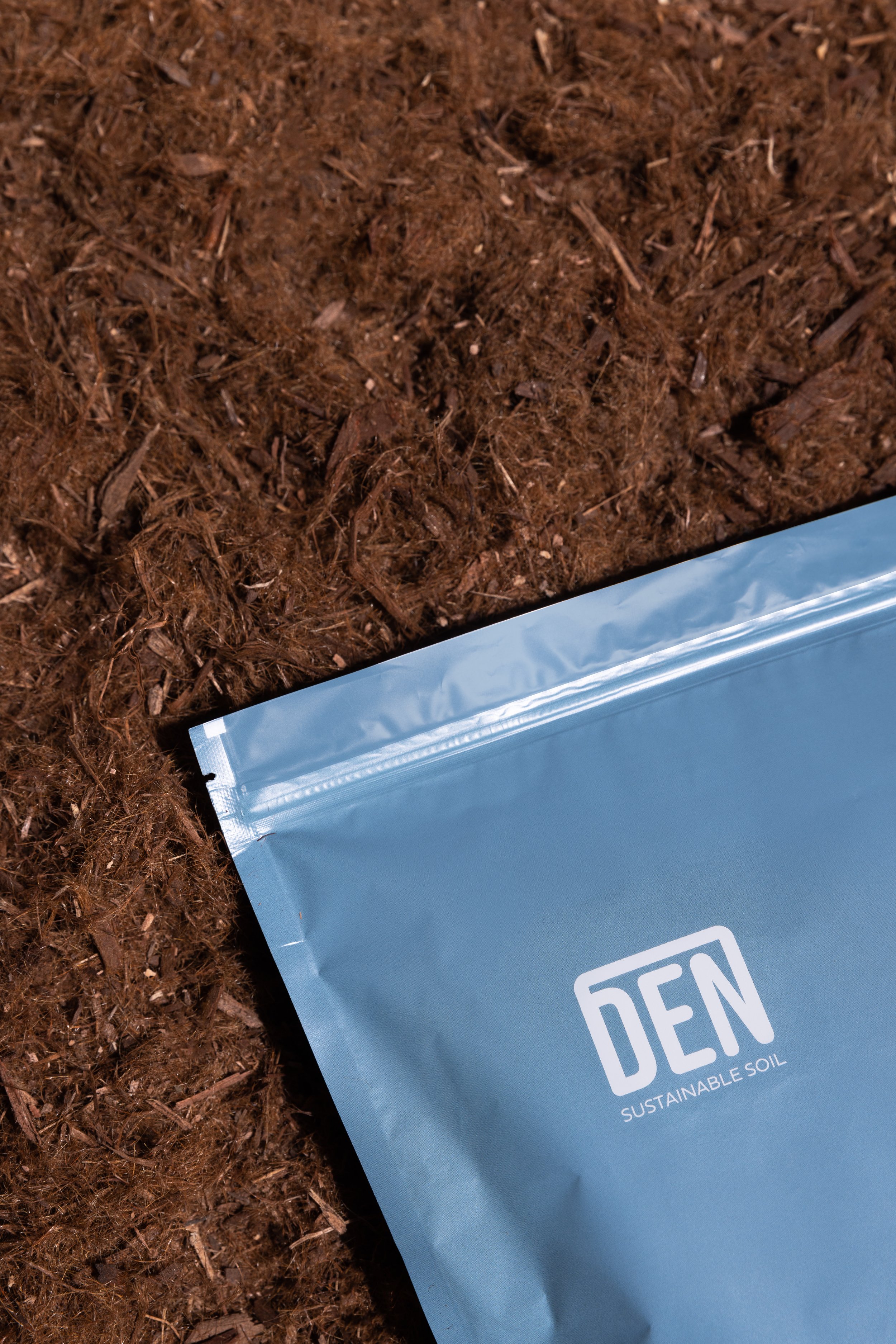 DEN-Package-On-Soil.jpg