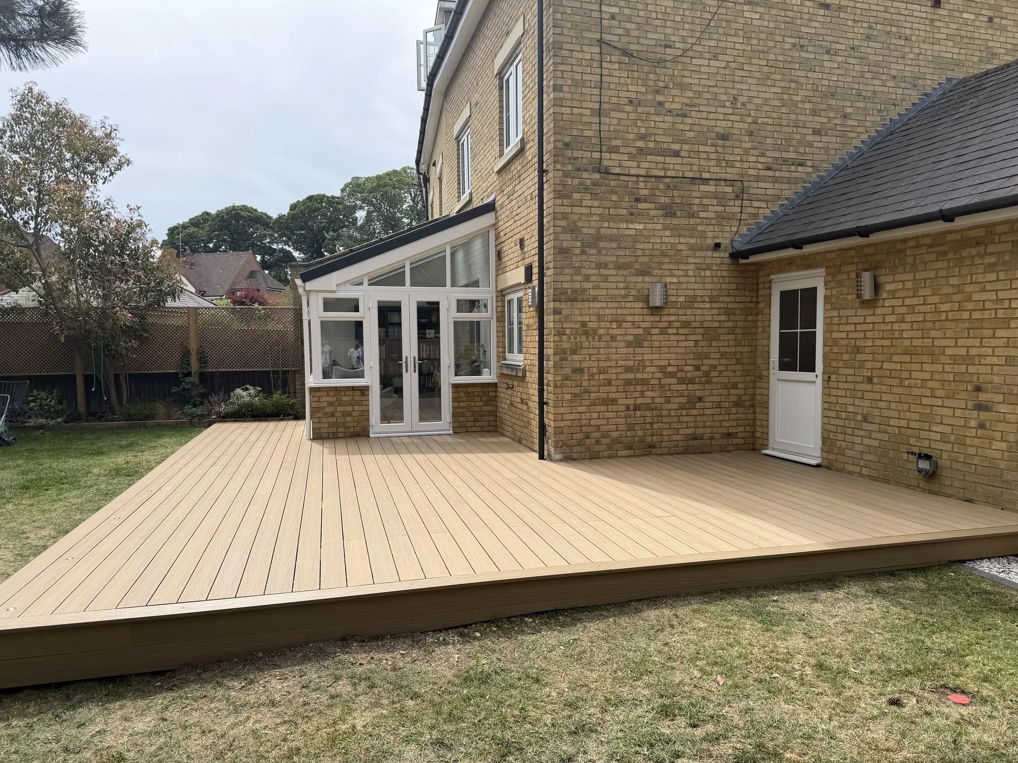 composite-decking-golden-oak-conservatory.jpg
