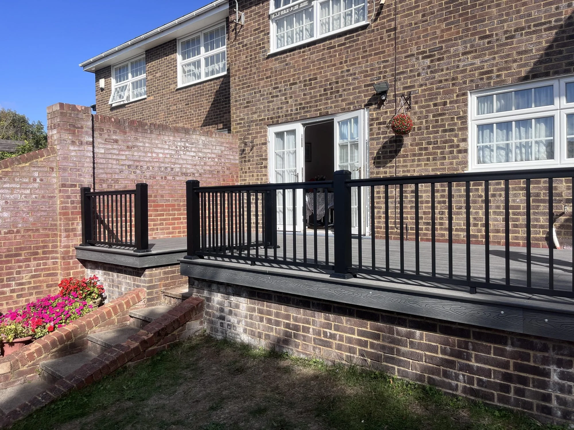 composite-raised-balcony-black-railings.jpg