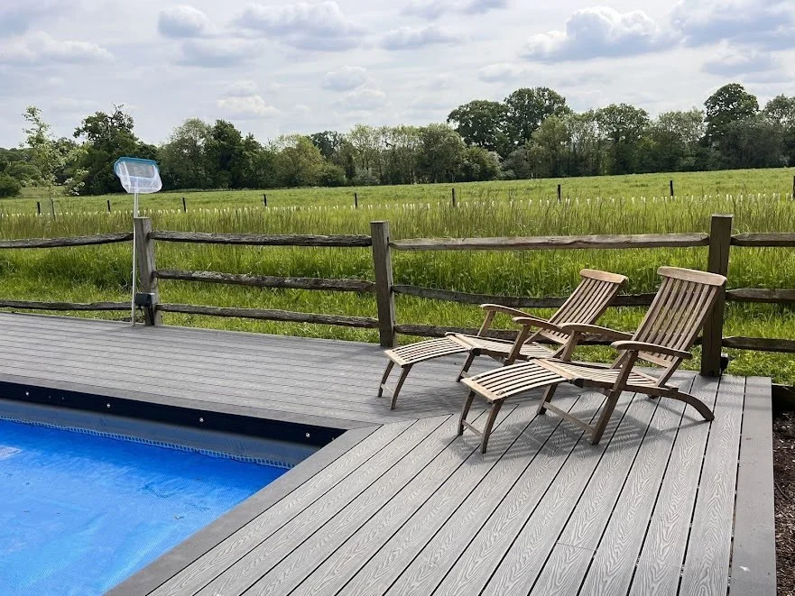 composite-poolside-decking-sun-loungers.jpg