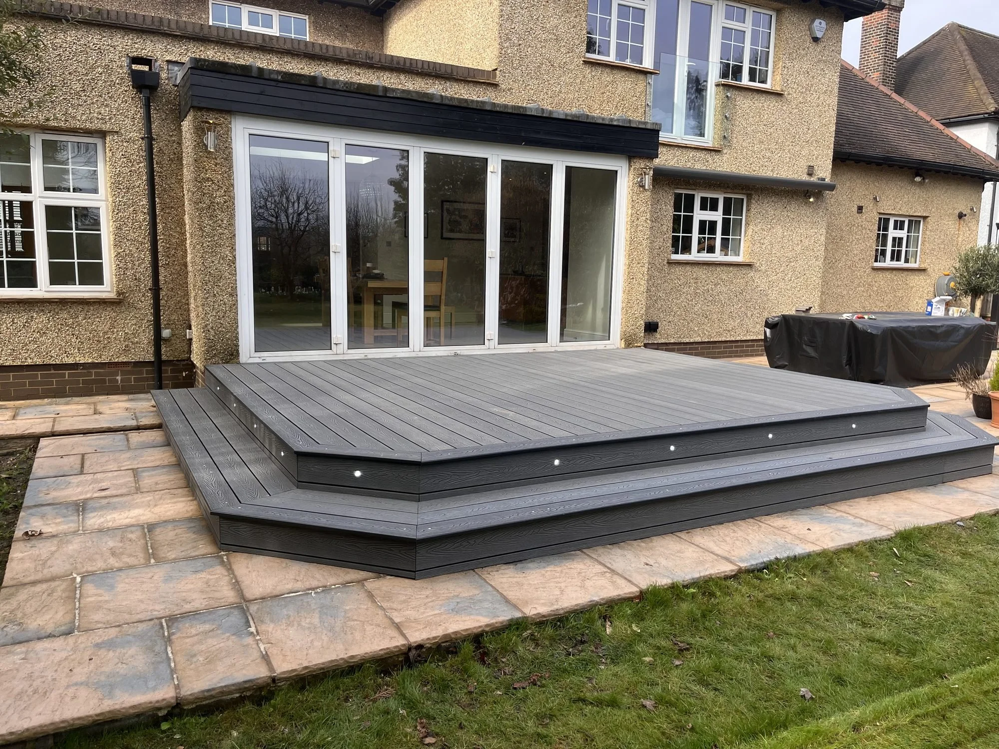 composite-decking-inset-lighting-bifold-doors.jpg