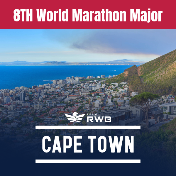 A panoramic view of Cape Town with city buildings near the coast, green mountains, and a partly cloudy sky. The image has a logo with a bird and the text "Team RWB" and "Cape Town".