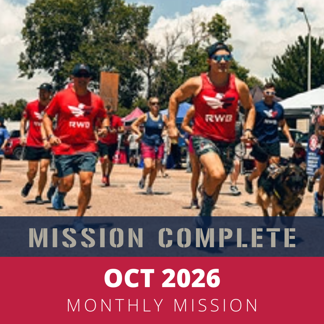 A group of people participating in an outdoor run event, wearing sports attire with some in red and others in blue, with tents and trees in the background, and a dog running alongside one of the participants. The event is labeled as October 2026 Monthly Mission.