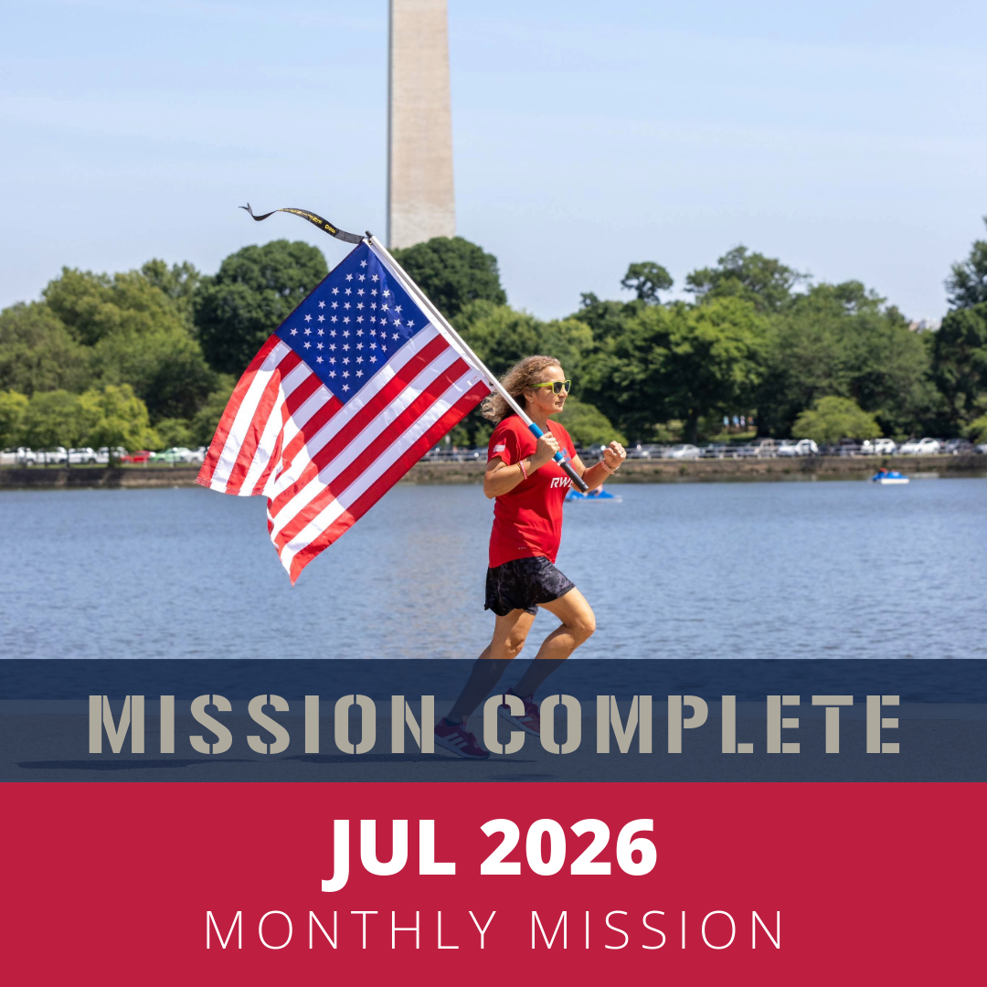 A woman running along a waterfront holding an American flag, wearing sunglasses, a red shirt, and red running shoes, with the Washington Monument and trees in the background, and a banner at the bottom that says 'JUL 2026 MONTHLY MISSION'.