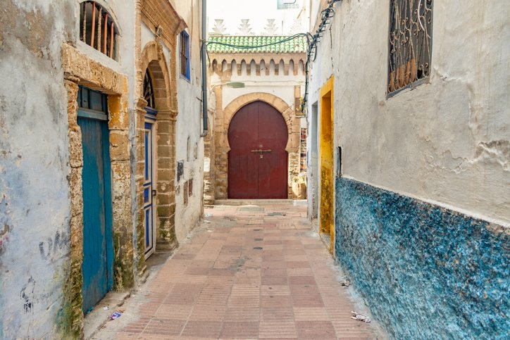 Street-in-the-Medina-of-Essaouira-Morocco-with-a-Fancy-Door-1151881392_727x484.jpeg