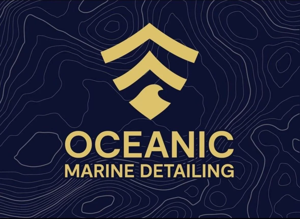 Logo for Oceanic Marine Detailing featuring a stylized gold wave icon and text on a dark background with light contour lines.