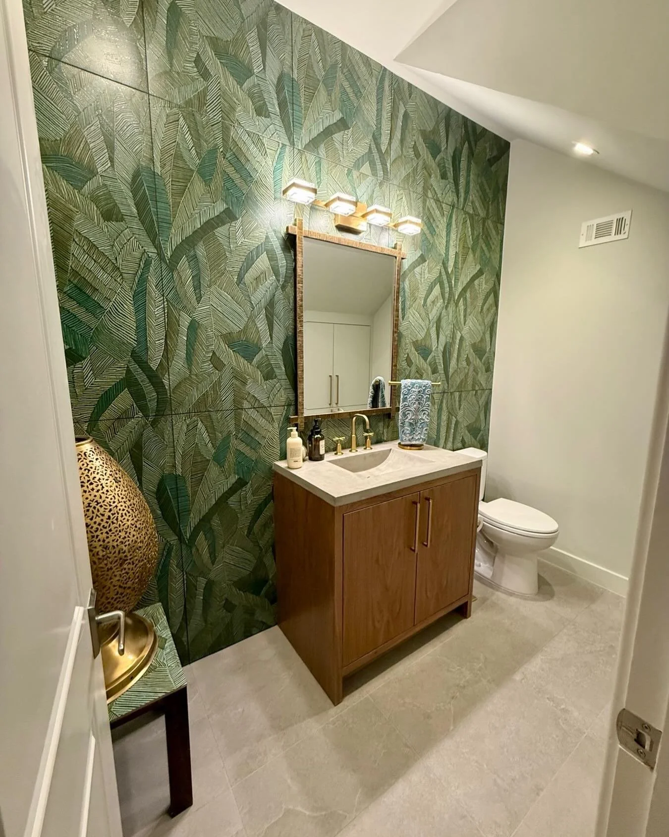 Do you see that tile?! It&rsquo;s all about this tile in this gorgeous powder bath. 

During the initial consult, the client said this bathroom was dark, gloomy, felt like a principal&lsquo;s office. No one ever wanted to go in there!  She wanted som