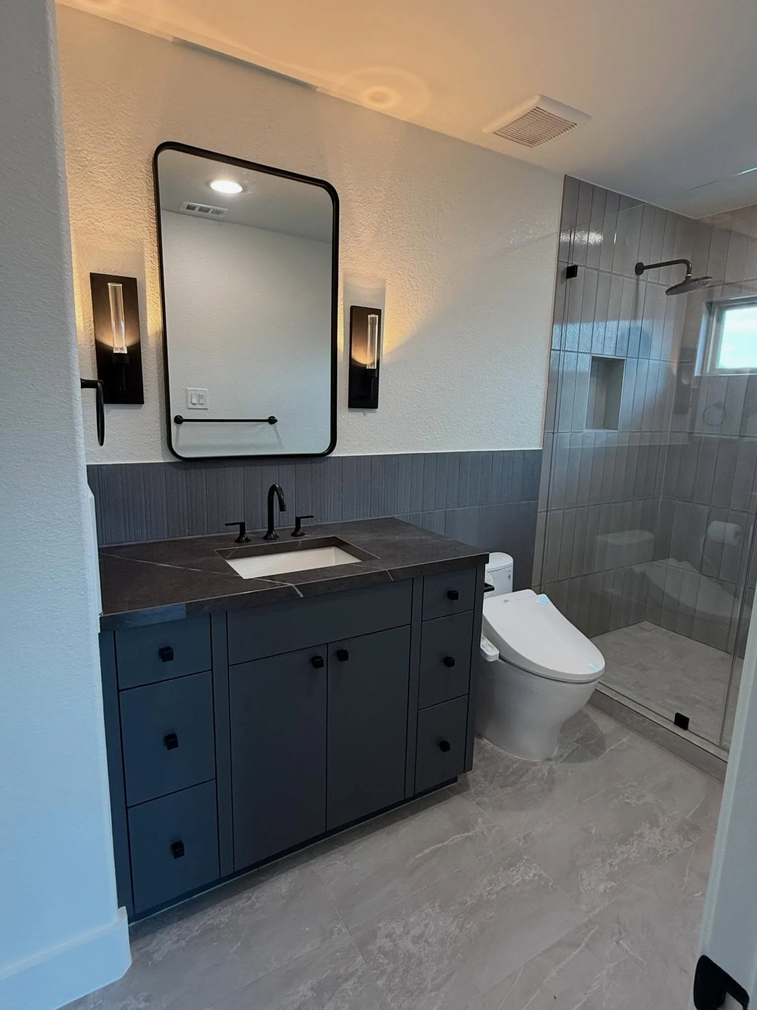 A scroll-worthy (honestly, save-worthy) lineup of bathrooms for your viewing pleasure.

From single-room renovations to full new builds with 7+ bathrooms&mdash;we design each space with intention, function, and that elevated finish that just hits.

N