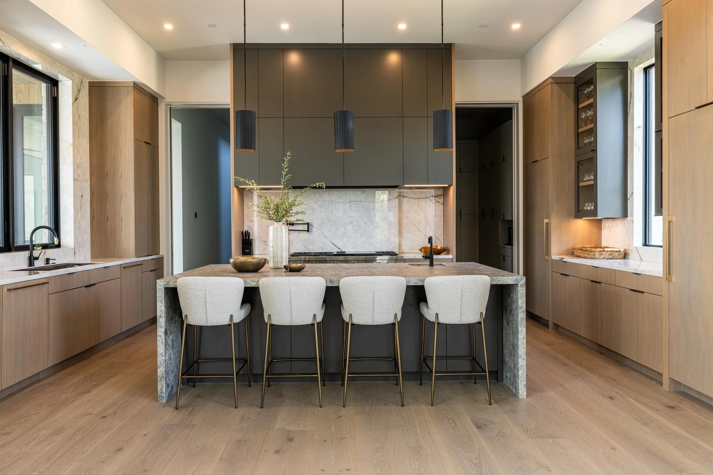 A well-designed kitchen starts with one thing: function. 

No matter how beautiful the finishes are, the layout is what truly makes a kitchen feel effortless to live in. The flow, storage, appliance placement, gathering spaces &mdash; every detail sh