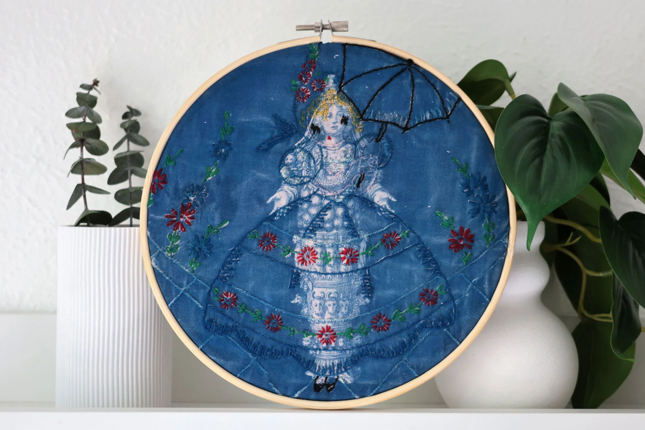 Cyanotype of Artemis of Ephesus on a vintage embroidered linen.