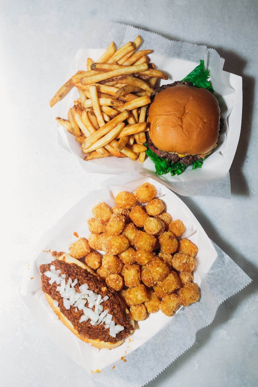 Monday vibes at @The_standardbhm:  A mouthwatering burger and a chilly dog&ndash; the perfect mid-month treat! 🍔

#MondayMunchies #ChillinWithMyDog #thefoodhall #Thepizitz