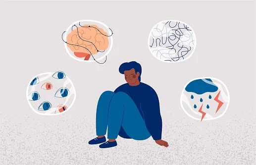 A person sitting on the ground with thought bubbles around them depicting mental health issues such as anxiety, depression, overthinking, and sadness.