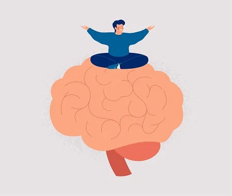 A person sitting cross-legged on top of a large, stylized brain illustration with arms outstretched.