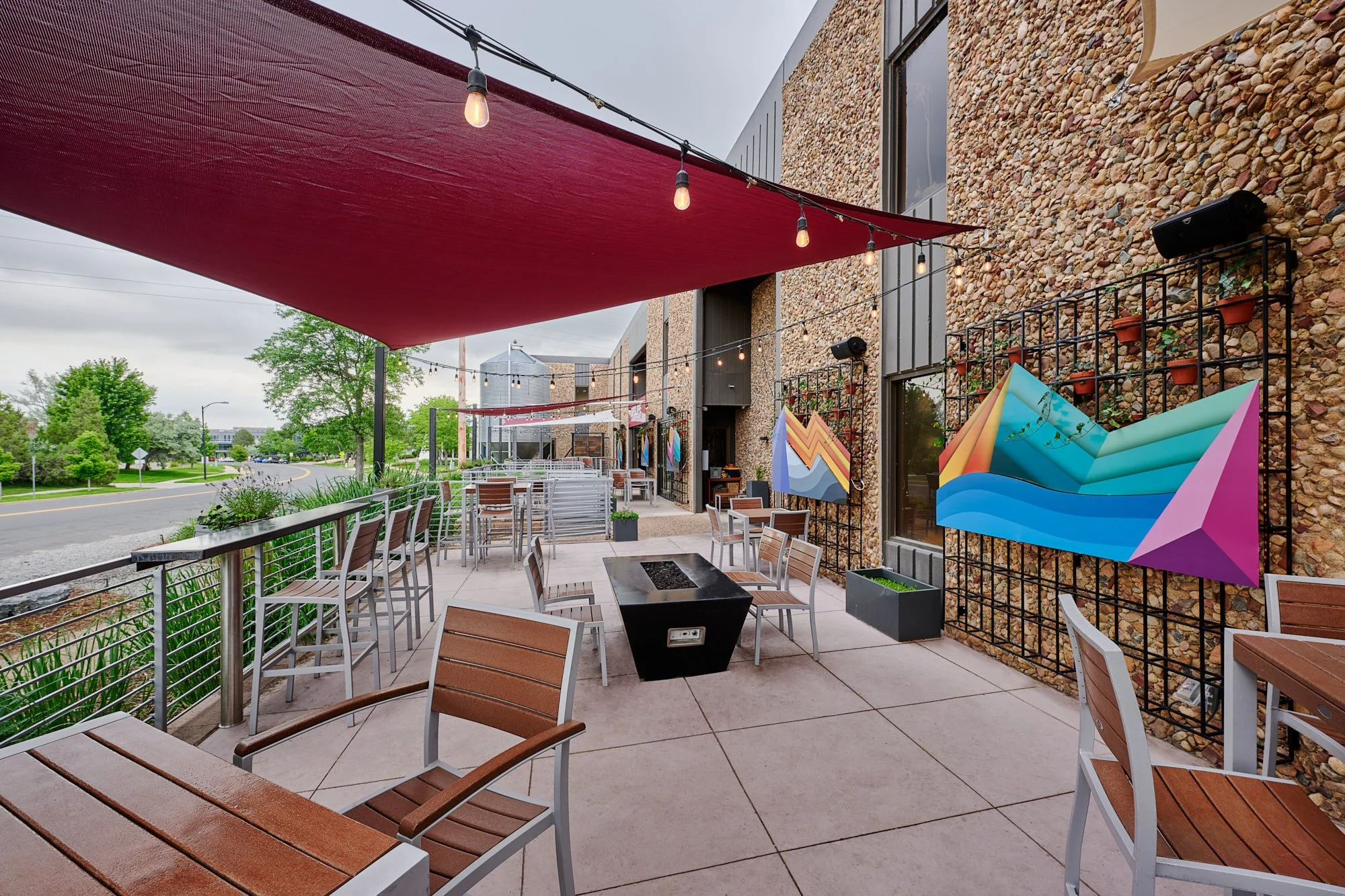 Upslope Brewery patio by Clark and Enersen in Boulder, Colorado at evening