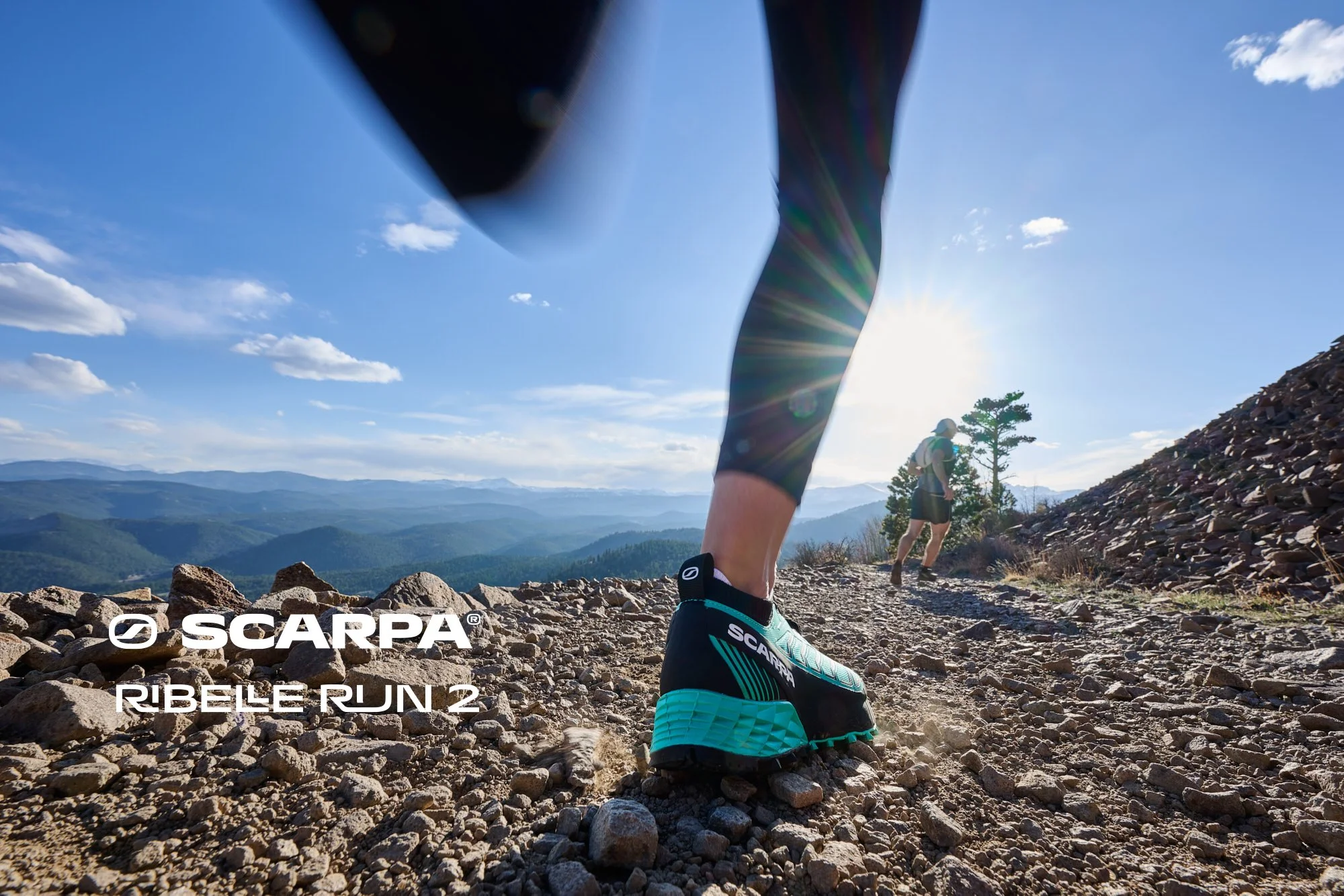 SCARPA Ribelle Run 2 trail running shoes on a rocky mountain trail in Colorado